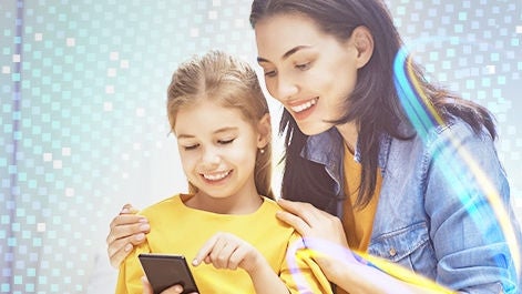 Mother and daughter with phone